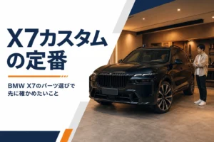 ガレージに止めた黒い大型SUVの前まわり